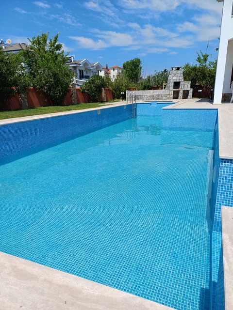 Photo of BBQ Area in the distance taken in April 2025